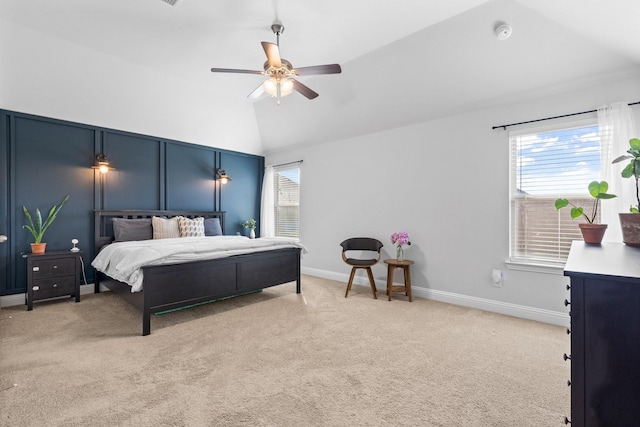 bedroom with light carpet, high vaulted ceiling, baseboards, and a ceiling fan