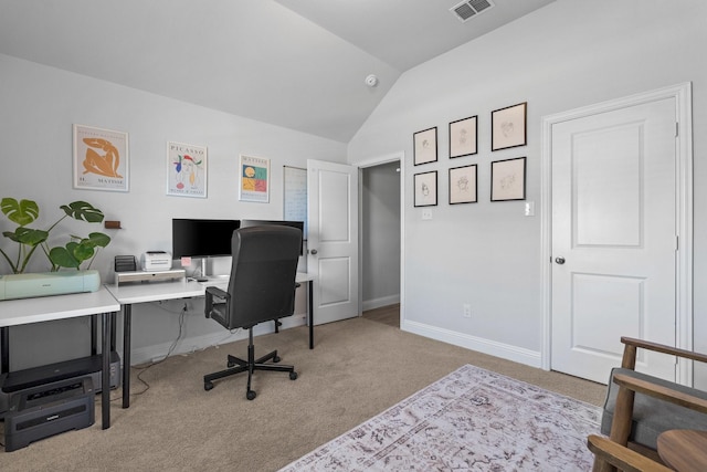 office area with visible vents, baseboards, carpet floors, and lofted ceiling