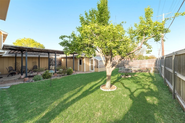 view of yard featuring a patio and a fenced backyard