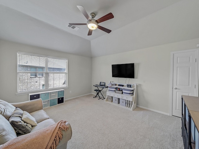 carpeted living area with visible vents, baseboards, a ceiling fan, and lofted ceiling