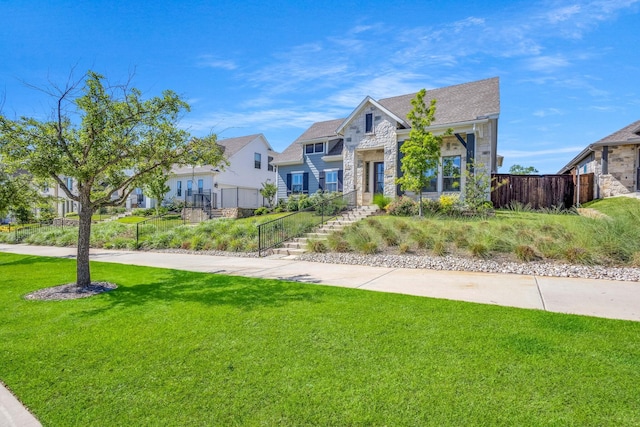 14229 Walsh Ave, Fort Worth, TX 76008 - view of front of home featuring stone siding, a residential view, and stairway