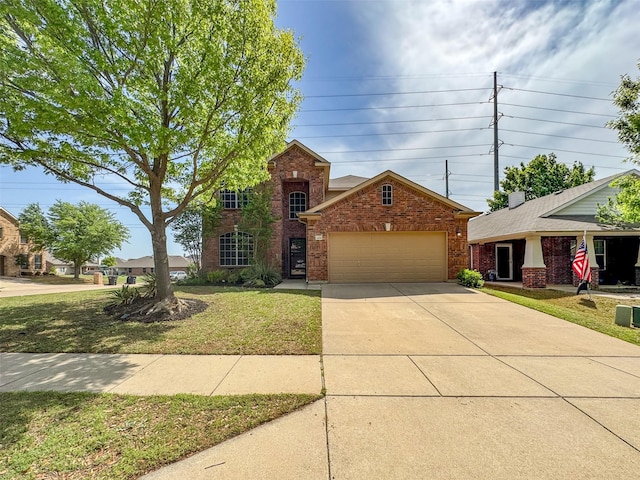 traditional-style house featuring brick siding, a front yard, driveway, and a garage