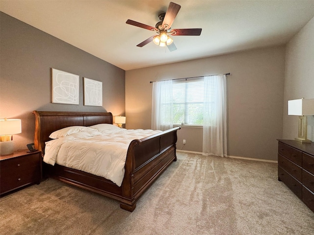 bedroom featuring carpet floors, ceiling fan, and baseboards