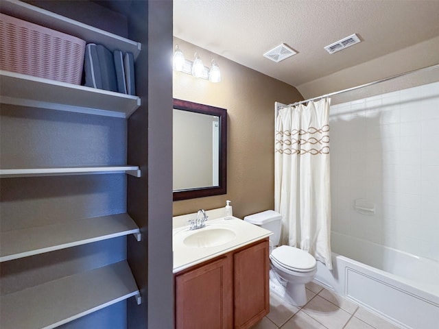 full bathroom with tile patterned floors, visible vents, vaulted ceiling, and toilet