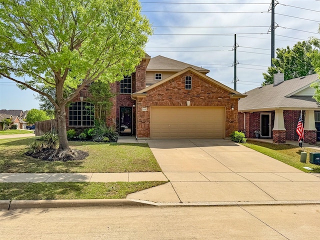 traditional-style home with concrete driveway, brick siding, a front lawn, and an attached garage