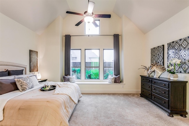 bedroom featuring baseboards, high vaulted ceiling, ceiling fan, and carpet flooring