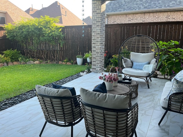 view of patio with a fenced backyard