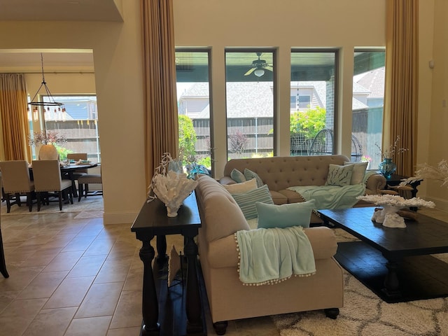 2018 Barley Place Dr, Allen, TX 75013 - living room with healthy amount of natural light, tile patterned floors, and baseboards