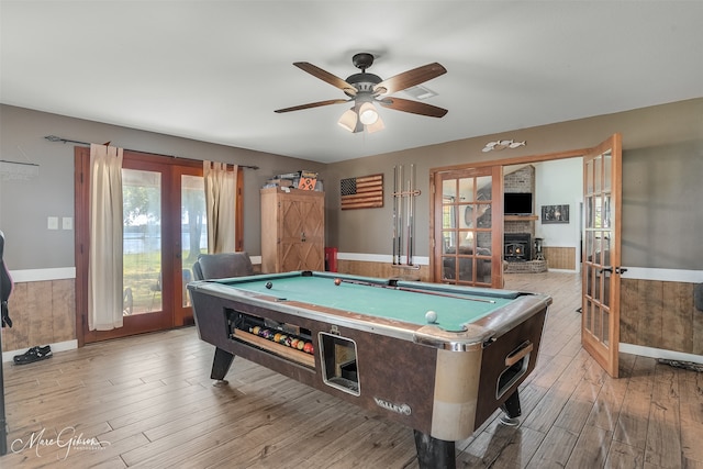 recreation room with wainscoting, french doors, billiards, and wood finished floors