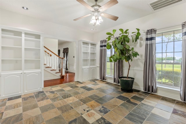 entrance foyer featuring ceiling fan, visible vents, stairs, recessed lighting, and stone tile floors