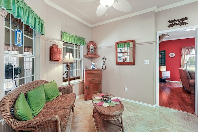 104 Fm 2450, Krum, TX 76249 - sitting room featuring ceiling fan, ornamental molding, tile patterned floors, and baseboards