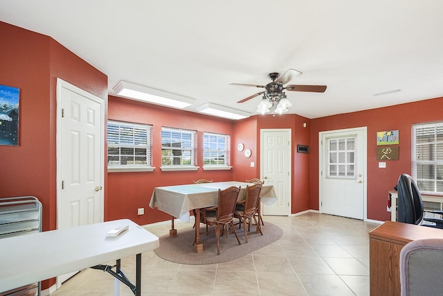 104 Fm 2450, Krum, TX 76249 - dining space with plenty of natural light, a ceiling fan, and baseboards
