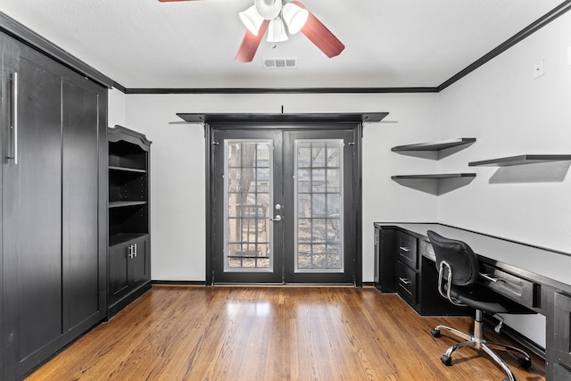 office area featuring french doors, ornamental molding, ceiling fan, wood finished floors, and baseboards