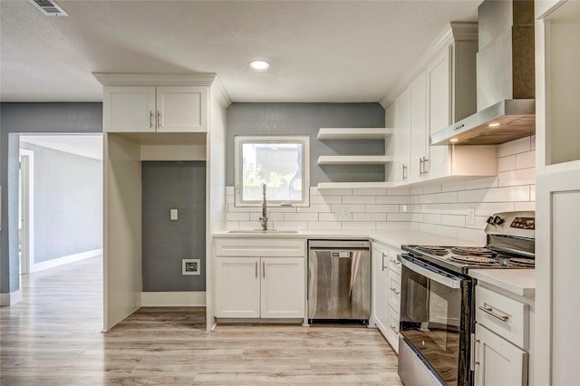 110 Pine St, Weatherford, TX 76086 - kitchen featuring stainless steel dishwasher, tasteful backsplash, wall chimney range hood, a sink, and electric range oven