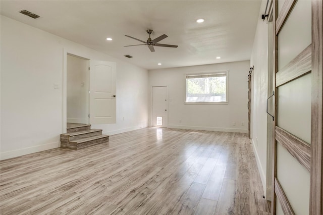 110 Pine St, Weatherford, TX 76086 - unfurnished room featuring visible vents, baseboards, a ceiling fan, recessed lighting, and light wood finished floors