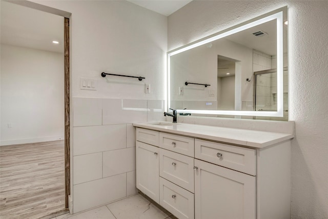 110 Pine St, Weatherford, TX 76086 - full bath with vanity, visible vents, and a stall shower
