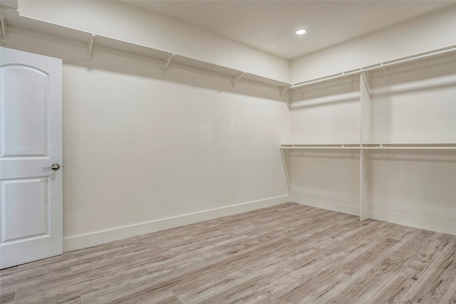 110 Pine St, Weatherford, TX 76086 - walk in closet with wood finished floors