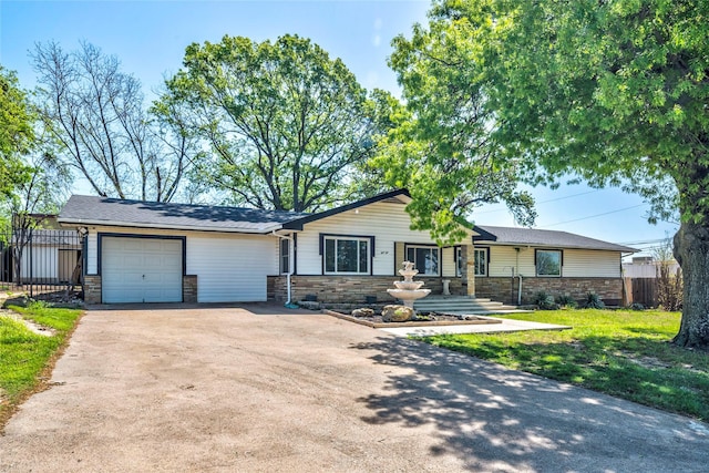 110 Pine St, Weatherford, TX 76086 - ranch-style house featuring concrete driveway, a front lawn, fence, and an attached garage