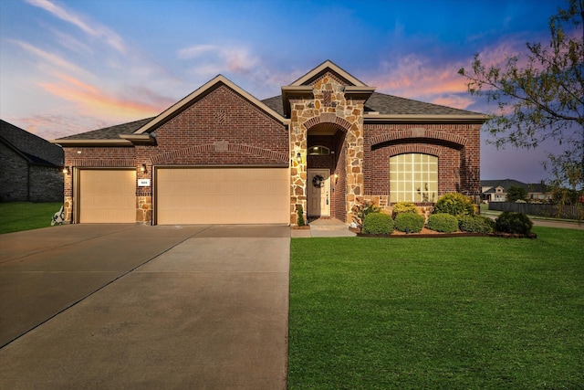 525 Northwood Dr, Oak Point, TX 75068 - view of front of house featuring concrete driveway, brick siding, a lawn, a garage, and roof with shingles