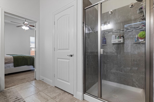 525 Northwood Dr, Oak Point, TX 75068 - full bathroom with a stall shower, a ceiling fan, ensuite bathroom, and tile patterned flooring