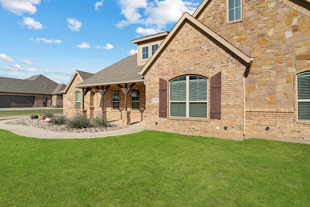 8370 Old Springtown Rd, Springtown, TX 76082 - rear view of property with a yard, brick siding, and roof with shingles