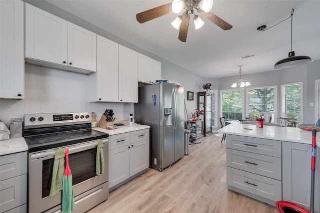 330 W Quitman St, Emory, TX 75440 - kitchen featuring stainless steel appliances, light countertops, gray cabinetry, light wood-type flooring, and a ceiling fan