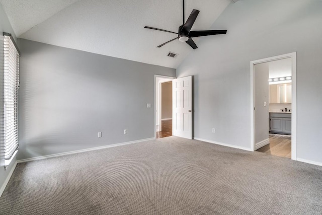 511 Windsor Way, Rockwall, TX 75087 - unfurnished bedroom with carpet floors, baseboards, high vaulted ceiling, ensuite bath, and a ceiling fan