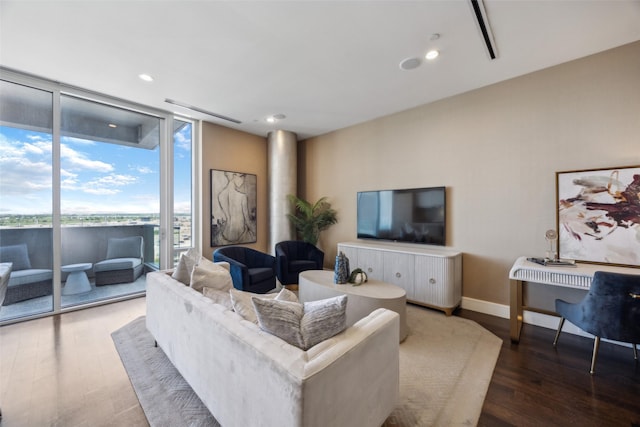 2408 Victory Park Ln Unit 1031, Dallas, TX 75219 - living area with baseboards, expansive windows, wood finished floors, and recessed lighting