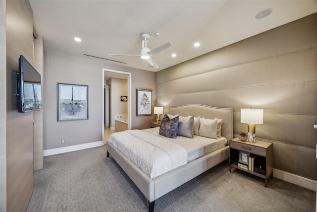2408 Victory Park Ln Unit 1031, Dallas, TX 75219 - bedroom featuring baseboards, recessed lighting, connected bathroom, and carpet