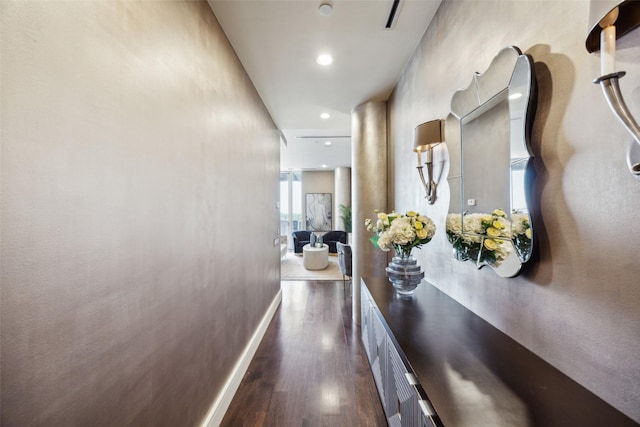 2408 Victory Park Ln Unit 1031, Dallas, TX 75219 - hall with dark wood-type flooring, baseboards, and recessed lighting