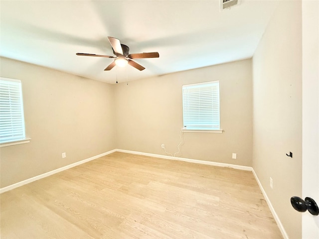 1901 SE 12th St, Mineral Wells, TX 76067 - unfurnished room with ceiling fan, light wood-style floors, and baseboards