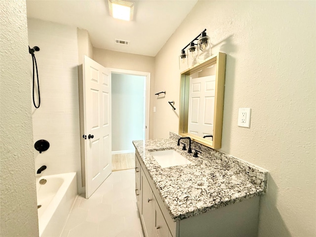 1901 SE 12th St, Mineral Wells, TX 76067 - bathroom featuring vanity and shower / tub combination