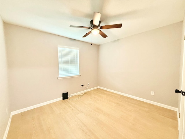 1901 SE 12th St, Mineral Wells, TX 76067 - spare room featuring a ceiling fan, light wood-style flooring, and baseboards