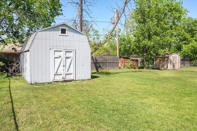 view of shed with a fenced backyard