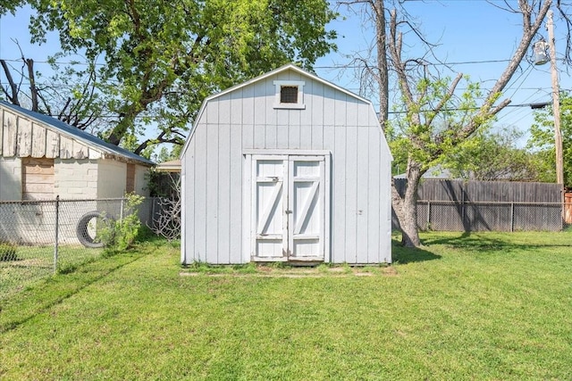 view of shed featuring a fenced backyard
