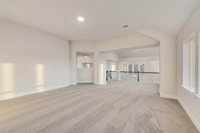 6926 Prairieside Trl, Prairie Ridge, TX 76084 - unfurnished living room with carpet flooring, lofted ceiling, baseboards, and recessed lighting