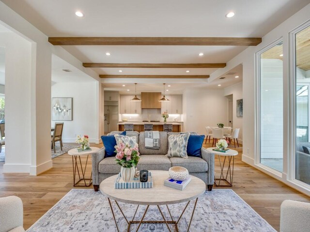6909 Middle Cove Dr, Dallas, TX 75248 - living room with beamed ceiling, baseboards, light wood-type flooring, and recessed lighting