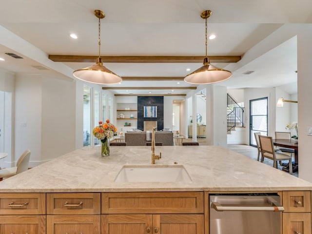 6909 Middle Cove Dr, Dallas, TX 75248 - kitchen featuring a sink, open floor plan, hanging light fixtures, and beam ceiling