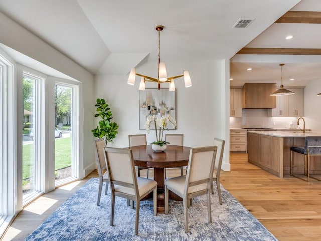 6909 Middle Cove Dr, Dallas, TX 75248 - dining room featuring visible vents, recessed lighting, a notable chandelier, and light wood-style floors