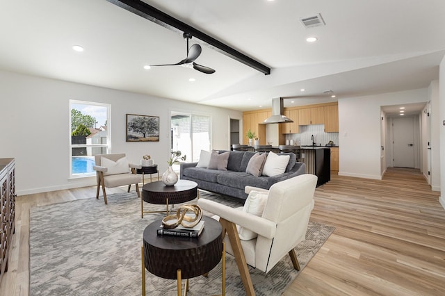 5629 Terry St, The Colony, TX 75056 - living room with light wood-style floors, ceiling fan, recessed lighting, and baseboards