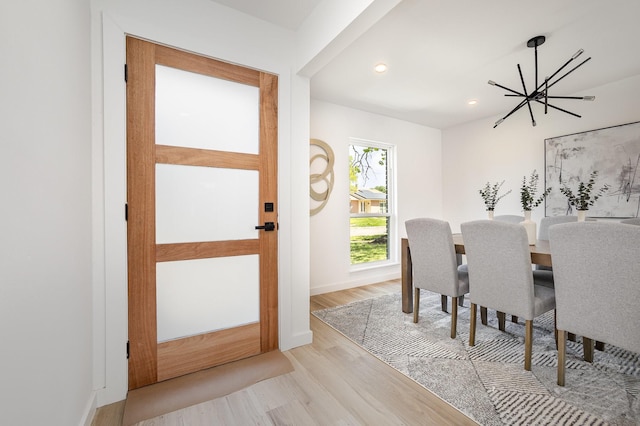 5629 Terry St, The Colony, TX 75056 - dining area with a chandelier, light wood-style flooring, recessed lighting, and baseboards