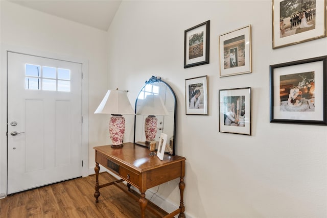 foyer with wood finished floors