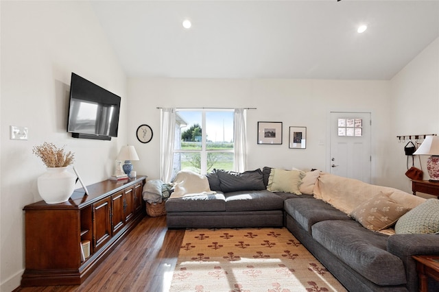 living area featuring recessed lighting, vaulted ceiling, and dark wood-style floors