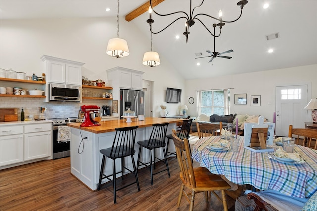 dining room with high vaulted ceiling, visible vents, dark wood-style floors, and beam ceiling