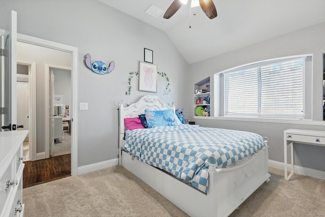 1057 Canterbury Ln, Forney, TX 75126 - bedroom with carpet flooring, lofted ceiling, baseboards, and ceiling fan
