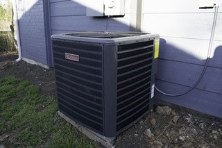 details with brick siding and central air condition unit