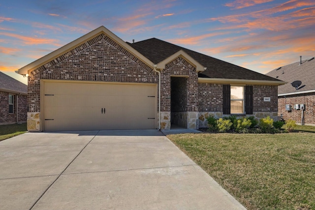 903 Saddle Club Way, Princeton, TX 75407 - view of front of home featuring brick siding, a garage, concrete driveway, a yard, and stone siding