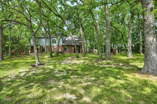 view of yard with fence