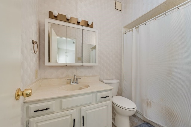 bathroom featuring toilet, wallpapered walls, vanity, and a shower with curtain