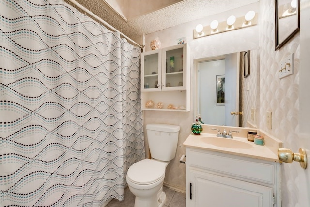 full bath featuring tile patterned floors, curtained shower, vanity, and toilet